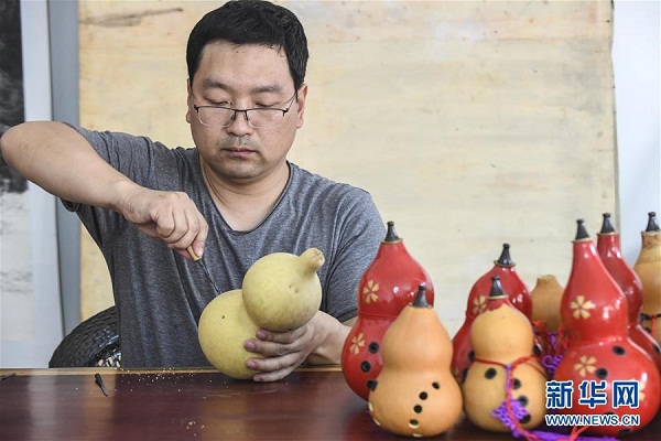 张志远：葫芦做乐器获国家专利